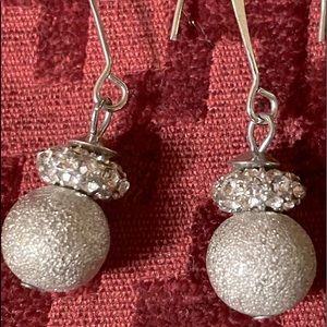 Dangling earrings silver with dimonique treatments. 3”